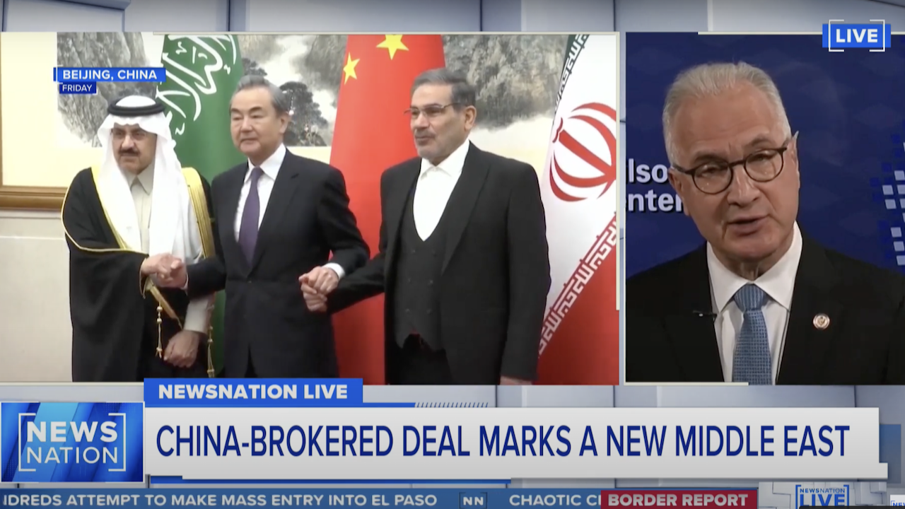 A news broadcast shows Chinese, Iranian, and Saudi officials shaking hands in front of their flags, with a commentator speaking on the right. The headline reads: China-brokered deal marks a new Middle East.