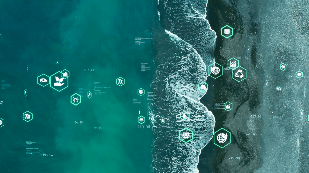 Aerial view of waves meeting a shoreline, overlaid with green hexagonal technology icons and data symbols representing environmental and sustainable development concepts.